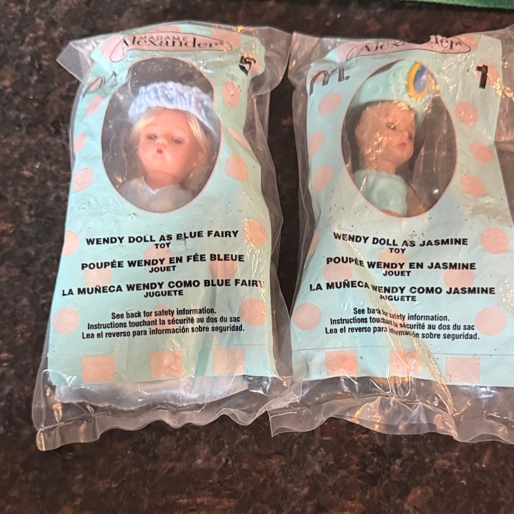 Vintage Madame Alexander dolls from McD’s Happy Meals. New-original packaging.